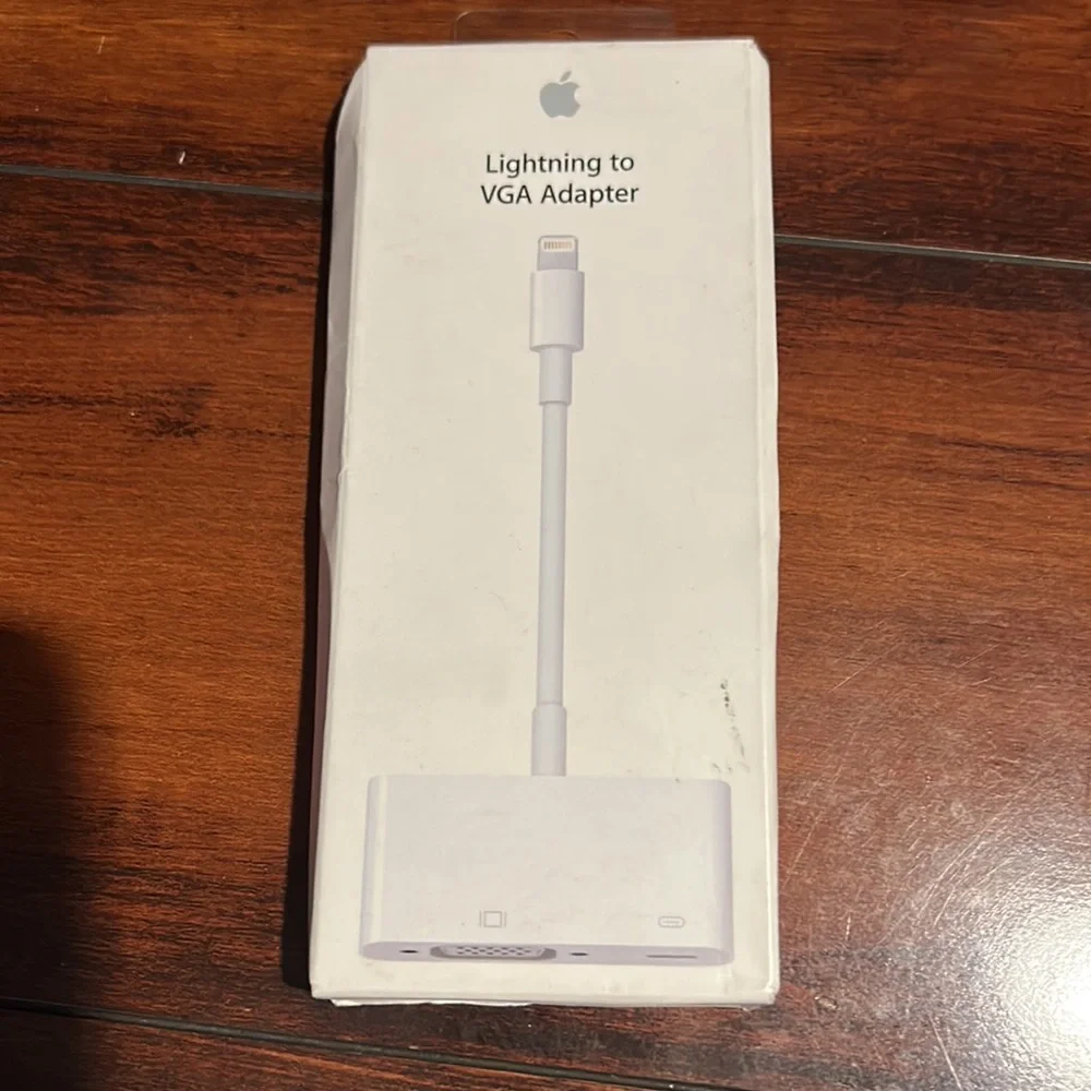 The lightening to VGA Adapter by Apple!